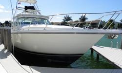 VESSEL WALK-THROUGH: DOOR PRIZE is a perfect example of an extremely well maintained, always lift stored, TIARA 4100 OPEN. This one-owner boat was ordered from the TIARA Factory with lots of additional customized features. The Master Stateroom is located