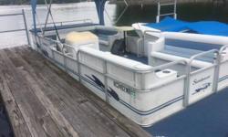 2000 Sundancer 240Cruise pontoon with 90HP Johnson motor. This boat is one owner, still in good shape. *Not priced with trailer