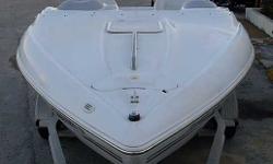 This 23 2001 Baja 232 is ready to blow away the competition. Likeall Bajas, its unique Baja True V Hull is built todeliver a smooth ride even in choppy water. It alsooffers options normally available only on larger boats, like drop-down Aero bolster