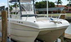 Sea Chaser 23' Catamaran Center Console with Twin Honda 130 hp Four Strokes . Excellent offshore fishing boat that can handle the rough stuff. Includes Aluminum Tandem axle Cat trailer. Includes T-Top, VHF Radio, Fishfinder, GPS, Front Spray curtain,