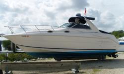 This 2001 Monterey 302 CR Express Cruiser has been meticulously cared for by its current owner who is an engineer. He has custom installed a cockpit table, beverage holders and removable carpets. She is powered by trusty Twin Mercruiser 5.0L EFI