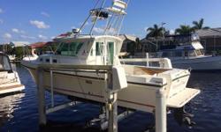 (LOCATION: Punta Gorda FL) The 28' Albin Tournament Express is a big, tough, go-anywhere fishing machine. She has a large open cockpit with fishing room, custom tower, and pilothouse with cabin for comfort. She is powered by a 235-hp horsepower Volvo