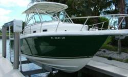 Top quality construction makes this boat an excellent offshore cruising / fishing boat with lots of ammenities . Twin Yamaha 225 hp Four Strokes. Boat is lift stored in super condition. Dark Green hull sides makes this one stand out !
Includes hardtop,