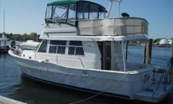 A COMPLETE LIVE-ABOARD VESSEL... THIS 39' MAINSHIP TRAWLER HAS A LARGE CABIN THANKS TO ITS 14 FOOT BEAM. THE FLOORPLAN INCLUDES DOUBLE BERTHS IN BOTH STATEROOMS AS WELL AS A SEPARATE STALL SHOWER IN THE HEAD. VISIBILITY FROM THE LOWER HELM IS EXCELLENT