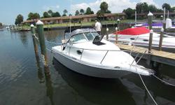 Price Reduction!!! Batteries and battery charger replaced this summer. Cushion added to seat by transom. Great Upgrades on this meticulously maintained Sailfish makes it well worth the investment. Whether you are overnight cruising or offshore fishing,