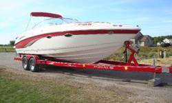 2003 Chaparral 265 SSi
Sport boat styling and cruiser amenities make the Chaparall 265 SSi a one-of-a-kind dual-purpose offering. Move freely bow to stern thanks to molded dashboard steps, UL-approved non-skid, and a center transon walk-through. The