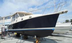 Just Reduced to $127,500.00
Custom 2006 Style Hardtop with Sliding Side Windows, Twin 240 Yanmar Diesels with 1480hrs, Raymarine C80 GPS/Chart, Raymarine VHF Radio, Oil X-Change-R System, All the Amenities of a 45ft Yacht. New Windlass
Bottom Painted and