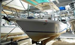 The Proline 22 Sport is a nicely laid out center console for coastal angers. The boat has a forward casting deck, along with deep freeboard for an extra measure of security while fishing offshore. She features a leaning post and t-top with rod holders,