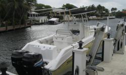 Lift kept, no bottom paint, fighting lady yellow hull on this 2004 270 Outrage. She is powered by twin Mercury 4 stroke 225 Saltwater Series engines with only 220 hours. These engines are commonly known as "Yama-Mercs" as they are essentially Yamaha 4