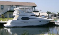 ACCOMMODATIONS & LAYOUT: &nbsp;&nbsp;2004 41 Silverton 410 Sport Bridge with Generator and Air Conditioning!&nbsp; This 410 Sport Bridge is absolutely gorgeous and was created for the mariner with million dollar taste.&nbsp; Just look at the high end
