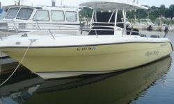 A big, exceptional quality, clean offshore fisherman with a roomy cockpit. This boat has every option available. She's constructed on a solid fiberglass deep-V hull and a wide beam makes this a stable fishing platform at trolling speeds. A large console