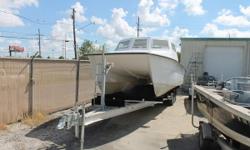 2005 Twin Vee 32
This 2005 32' Twin Vee was going to be the ultimate dive boat. The project lost steam and now needs to be finished by its buyer. All wood was taken out of the boat and replaced with Coosa. Custom pilot house built and live bait and kill