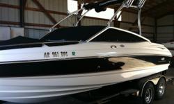 2006 Chaparral 210 SSi, 5.7 Liter 350 Mag, 126 hours, Factory wakeboard tower,&nbsp; factory bimini top, tower speakers w/ PA system, 4 wakeboard racks, Factory swim deck with water access radio controls, cd player w/ sirius radio, docking lights, anchor