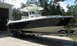 Description
(LOCATION: Brookesville FL) The Everglades 260 Center Console is a serious offshore fishing machine. She has a large open cockpit with fishing room fore and aft with all the amenities needed for successful fishing. The 260 CC shares the wider