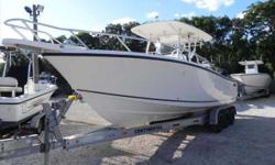 This is a really nice riding big center console Mako but equipped with twin 275 Mercury Verado four strokes. Most of the newer 28 Mako boats came with two stroke engines but this one was ordered with the four strokes. The engines have had full services