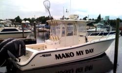 This meticulously maintained Mako 284 CC defines sport fishing. Her powerful twin Mercury Verrado 250 HP 4-stroke engines are equipped with smartcraft gauges and EXTENDED WARRANTY until 12/2011. Options and features includes: Raymarine C80 AND E120 GPS ,