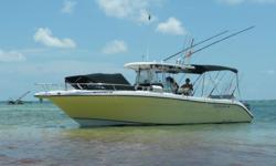Very well maintained BIG (beam = 10'6") center console. This boat looks fantastic, and the current owner has taken great care of her.
This boat has an enormous amount of storage space. In the bow there are (2) 311Qt. Insulated boxes under the bow seating,