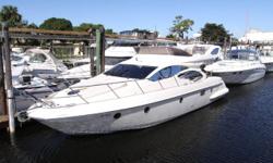 This Azimut motoryacht is a well-appointed cruiser from a builder that specializes in high quality, high style boats. She features a good sized cockpit and flybridge with expansive seating, and a lower helm for cursing in bad weather. With her low-slung