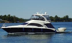 52' Flybridge Sea Ray with Cummins Inboard Diesels, used only in fresh water Located in the North East in the 1000 Islands region. Includes 13' 2006 Boston Whaler with 25 hp. Mercury outboard. Midnight Blue hull with custom canvas enclosure, bow thruster,