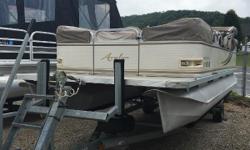 The Great Outdoors Marine - The Fun Starts Here!
We have this 2006 Avalon Tropic C 20 powered with a 2006 Yamaha 60hp
4-stroke outboard. The boat also comes with a 2006 LoadRite single axle
trailer with a spare tire. The upholstery and carpet of the boat