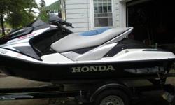 IM SELLING THE HONDA JETSKI WITH THE YACHT CLUB TRAILER, THE TIGERSHARK IS NOT INCLUDED...2006 HONDA AQUATRAX R-12X TURBO 4 STROKE 165 HP. HAS UNDER 40 HRS ON IT. VERY FAST SKI WILL GO 70 MPH. COMES WITH THE HONDA PROTECTION PLAN THAT IS TRANSFERABLE BUT