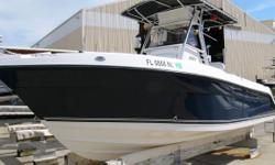 This 2301 Century has room to seat 6 to 8 people comfortably between the aft bench seat, the console seating and the forward seating. The hull is Flag Blue, She has only 138 hours and the T-top is ready for outriggers.
MAIN DECK:
Head in console
Folding