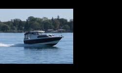2007 Bayliner 289 Discovery All standard features of the 289 plus Artic White with Blue Hull (colored hull side upgrade), 350 mag (less than 20 hours), Electric Engine Hatch, Transom Shower, Transom seat and table, Helm stereo remote w/2 additional