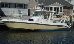 A YELLOW HULL BEAUTY....A Versatile Center Console with Integrated Hardtop/Windshield Combine All-Weather Versatility with Executive-Class Amenities, State-of-the-Art Construction. Highlights include Standard Leaning Post/Helm Seat with 66-Gallon