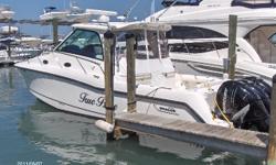 She is the flagship cabin boat for Boston Whaler. Climate control helm area allows for boating in any weather. All glass helm on sides and forward reduces the canvas headache! Loaded with options: dual Northstar color plotter, radar, auto pilot, and