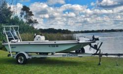 2008 Hewes Tailfisher 17 Bay boat powered by a 2013 Yamaha 70HP 4 stroke outboard. 2008 EZ loader aluminum trailer included. Package equipped with Powerpole (new in 2016), Minnkota 80lb Riptide trolling motor with remote, Poling platform, push pole, spare