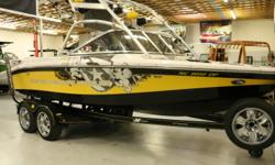 Come see this well taken care of Super Air Nautique 210. PCM Excalibur engine. With almost every option included. New tires, bluetooth stereo, 6 tower speakers, and many more options.
The Super Air Nautique 210 wakeboard boat by Correct Craft has a long