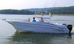 (LOCATION: New Port Richey FL) This ProKat 2560 Dual Console Fish N Fun &nbsp;is a common sense fisherman with her catamaran hull providing safety, stability, room, and speed.&nbsp;With a large cockpit with room to fish fore and aft this dual console