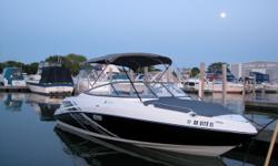 Yamaha SX230 High Output bow rider - Black hull, Bimini top, Cockpit covers and trailer too...estimated at 120 hours on the twin engine jet drive power! One owner and rack stored! Lots of room for family and friends, integrated swim platform for easy
