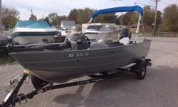 CONSIGNMENT BOAT! CUSTOMER HAS! 2009 LUND 1725 REBEL XL DUAL CONSOLE 50 ELPTO 2 STROKE MERCURY 4 SEATS TRAILER WITH SPARE & SWING TONGUE BIMINI TOP 46LB MOTOR GUIDE TROLLING MOTOR LOWRANCE DEPTH FINDER LADDER STEREO 3 ACROSS THE FRONT BASES COVER