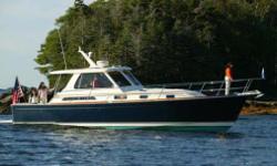 The Sabre 38 Express (originally called the Saberline 38 Express) combines classic Downeast styling and lively performance in a hardtop cruising yacht of exceptional beauty. Built on vacuum-bagged hull with a wide 13-foot, 8-inch beam and prop pockets,