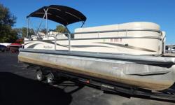 This is a nice big pontoon boat! It is powered by a 115 hp Yamaha 4 stroke engine and comes with a newer tandem axle trailer. It also features a bimini top, changing room, playpen cover, CD stereo, attached swim ladder, tilt steering wheel, and a ski tow.