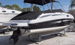 Purchased just 1 year ago, this exceptionally clean 2011 Sea Ray 260 Sundeck has been kept high and dry at MarineMax Sarasota since new. Gorgeous Black Two-Tone exterior with Quartz & White interior. The owner is moving up to an even larger Sea Ray so is