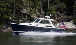 Slightly used, like new Back Cove 30 with all the factory options and dealer
installed canvas and electronics.
Introduction
Layout includes a convertible V-berth area with dining table, galley and head. Helm deck has Stidd seating with port and starboard