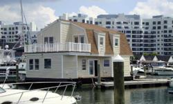 (LOCATION: Quincy MA) There is waterfront living and then there is living on the water. This two-bedroom custom houseboat surrounds you with water and all the sights and sounds that go with it. 1500 square feet of condo style living conditions on the