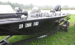 This boat is equipped with a 60 ELPT EFI 4-strk Mercury outboard engine. A Motorguide 70lb 24V X3 trolling motor with an onboard charger. Underneath is a&nbsp;Karavan Trailer. A Lowrance X-4 Pro Fishfinder mounted on the dash. 2 Fishing seats, batteries
