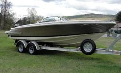 Standard Features Include; Heritage Trim Edition, selectable exhaust, black bimini top, black mooring cover, black bow & cockpit cover, air compressor, snap in cockpit carpet, dual batteries w/ switch, trim tabs, auto fire suppression, tilt steering