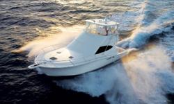 DEALER PROVIDED DESCRIPTION
The 4800 Convertible - Equipped with twin CAT C18 ACERT/885 H.P. or 1015 H.P. diesels -is fully capable of handling bluewater fishing and/or sea cruising (diesels available with an engine chrome package at extra cost). An