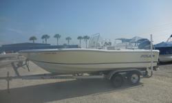 This 2012 Key West 176CC Center Console boat is 17 feet 7 inches in length with a beam of 7 feet 4 inches. Features include a Standard Horizon Marine Band Radio, Ritchie Compass, Flip - Flop Cooler Seat, Live Well, Molded Swim Platform with Stainless