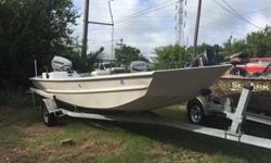 This is a no frills no mess workhorse of a boat. It has lots of space for equipment and gear. The modified V hull provides a great ride even when loaded out. It is a side console to maximize space and is powered by an Evinrude 50HP Etec engine. It comes