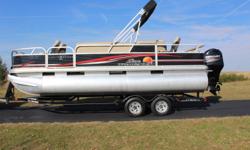??2013 Suntracker Fishin Barge 22 DLX
Black with beige Vinyl flooring, front and rear aerated livewells, built on rear ladder, changing room, table, Jensen CD player and 35 gallon fuel tank.
Mercury 90hp EFI 4 stroke motor, we have all the books and