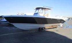 Check out this 2014 Everglades 325 CC rigged with twin Yamaha F350 Four Stroke engines equipped with the Yamaha Helm Master Joystick option!!!
Installed electronics include twin Raymarine E-165 Hybrid Touch GPS and Bottom Machines, Satellite Weather