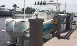 *****PRICE REDUCED $25,000 -- OWNER SAYS SELL***** 2014 Intrepid 327 CC300 Yamahas - 296 HoursLift Stored, No Bottom Paint Twin Garmin Touch Screen Plotters Bow Thruster Radar and Separate Autopilot Display Dive Door Upgraded JL Audio Sound System with
