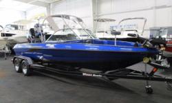 2014 Triton 220 ESCAPE
LOADED 2014 TRITON 220 ESCAPE WITH ONLY 12 ENGINE HOURS AND FACTORY ENGINE WARRANTY THRU 4-24-2017!&nbsp; A 250 hp Mercury Optimax Pro XS direct-injected outboard powers this loaded fiberglass fish and ski combo.&nbsp;&nbsp;Features