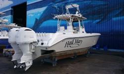 An immaculate, dry store kept , Everglades 325CC. Powered by the preferred twin Yamaha F300 V6 with low hours and still under warranty. Top of the line Garmin electronics including twin 16" touch screens at the helm, Garmin autopilot. CHIRP transducers,