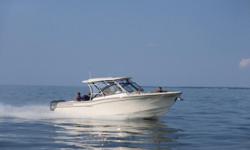 Fish Lake Erie on Grady-White's 307 Freedom! This dual-console is loaded with features that bolster fun and fishing! Upgrades include painted hard top, cockpit wet bar w/ refrigerator, canvas enclosure and many more options!
One Owner & Freshwater Since
